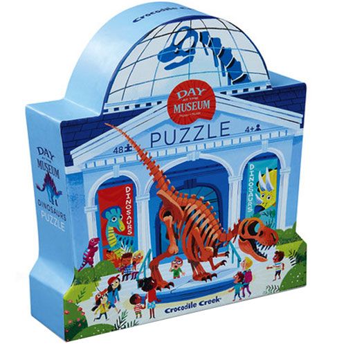 Crocodile Creek legpuzzelverpakking met een museumthema en dinosaurussen.
