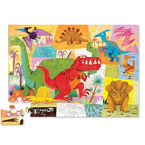 Crocodile Creek vloerpuzzel met diverse kleurrijke dinosaurussen, deels in elkaar gezet.