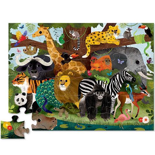 Complete Crocodile Creek vloerpuzzel met een kleurrijke afbeelding van diverse jungledieren, met enkele losse stukken.