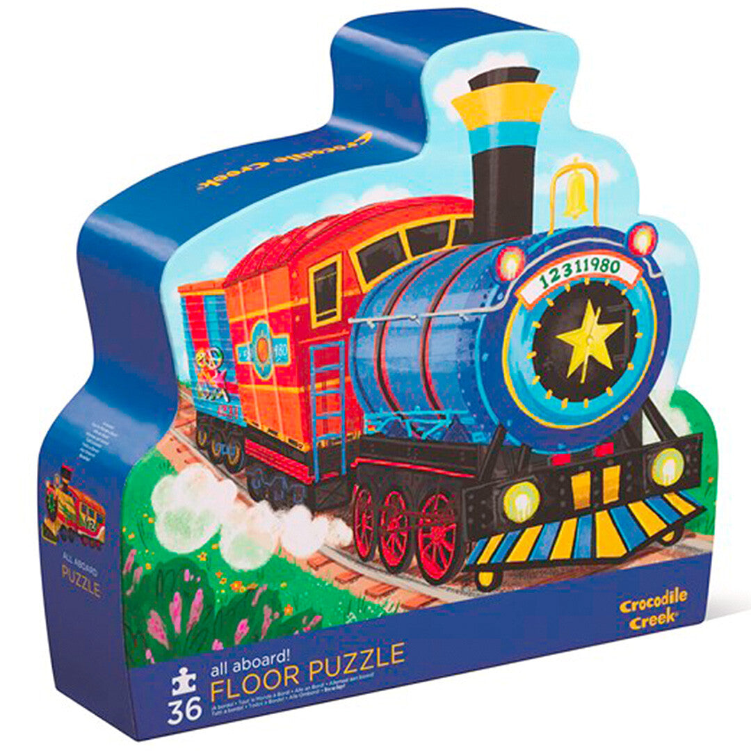Crocodile Creek vloerpuzzel treinen verpakking in de vorm van een blauwe stoomlocomotief met rode wagon.