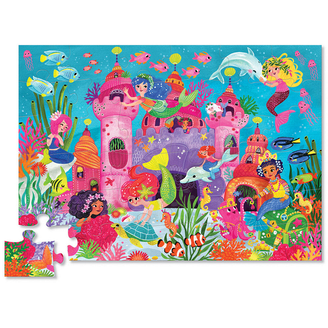 Crocodile Creek vloerpuzzel zeemeerminnen paleis met onderwaterwereld van mermaids en zeedieren, met één los puzzelstuk.