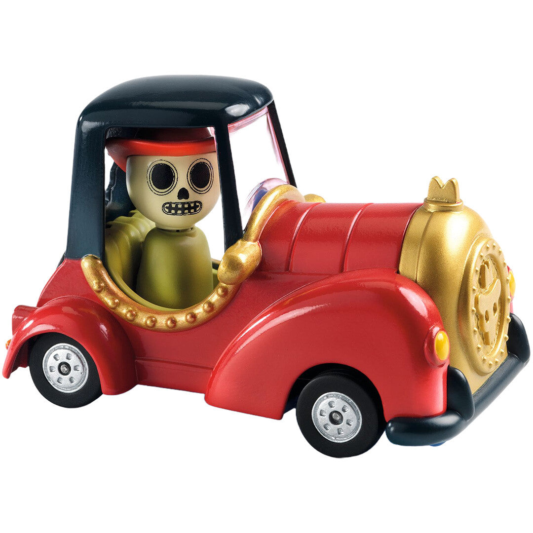 Djeco speelgoedauto 'Red Skull' met een skeletfiguur in een rode auto.