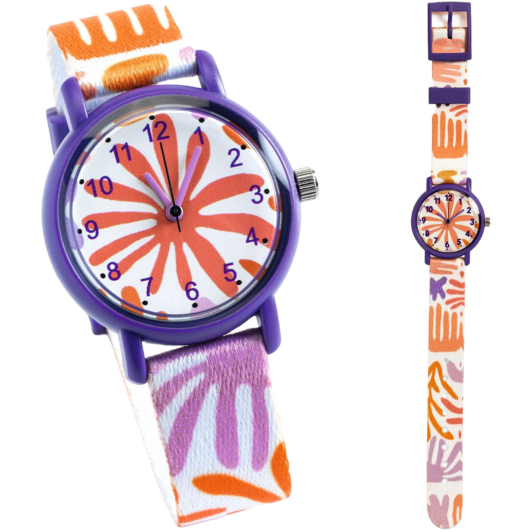 Djeco kinderhorloge met paarse kast, wijzerplaat met oranje bladeren en een bandje met abstracte patronen.
