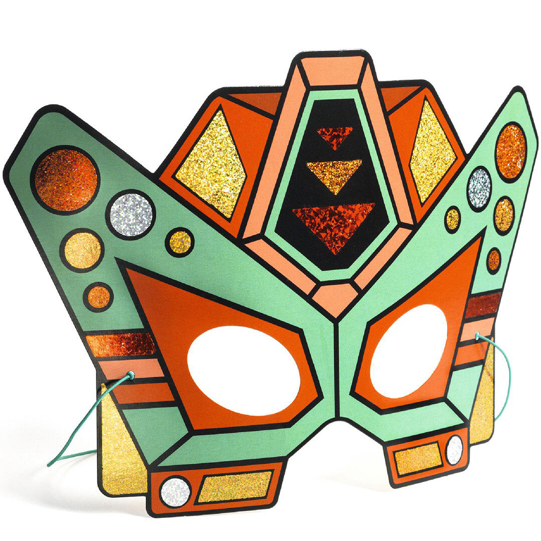 Detail van een afgewerkt groen en oranje Djeco robotmasker met glimmende metallic accenten.