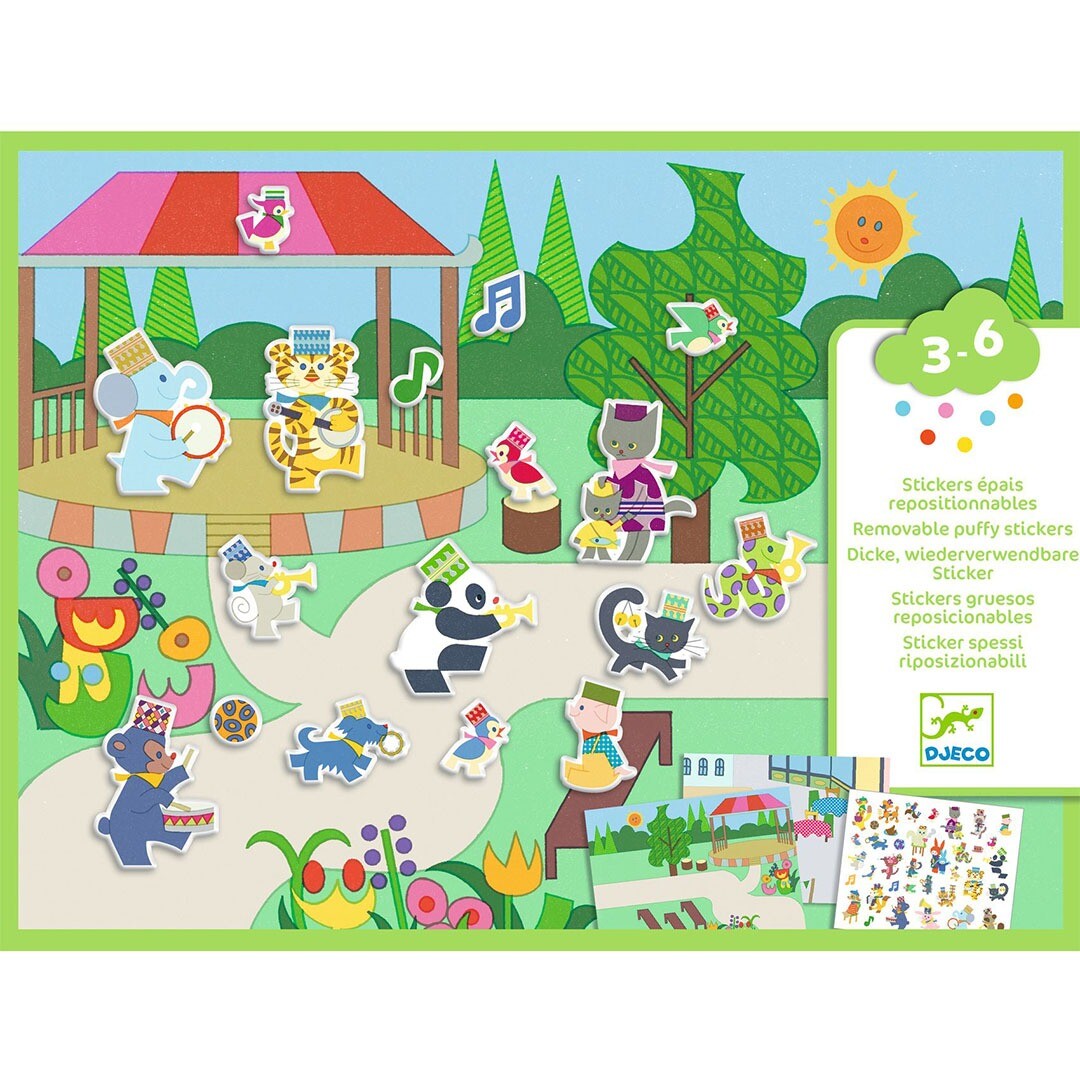 Djeco knutselset met herbruikbare stickers van een dierenfanfare in een park, met de verpakking en een stickeroverzicht.