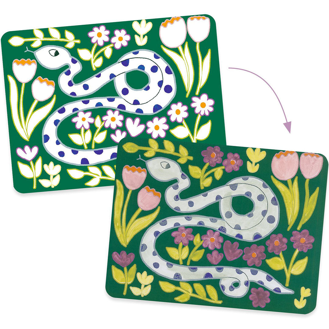 Demonstratie van de Djeco knutselset met een onbeschilderde en een beschilderde kaart van een slang met bloemen.