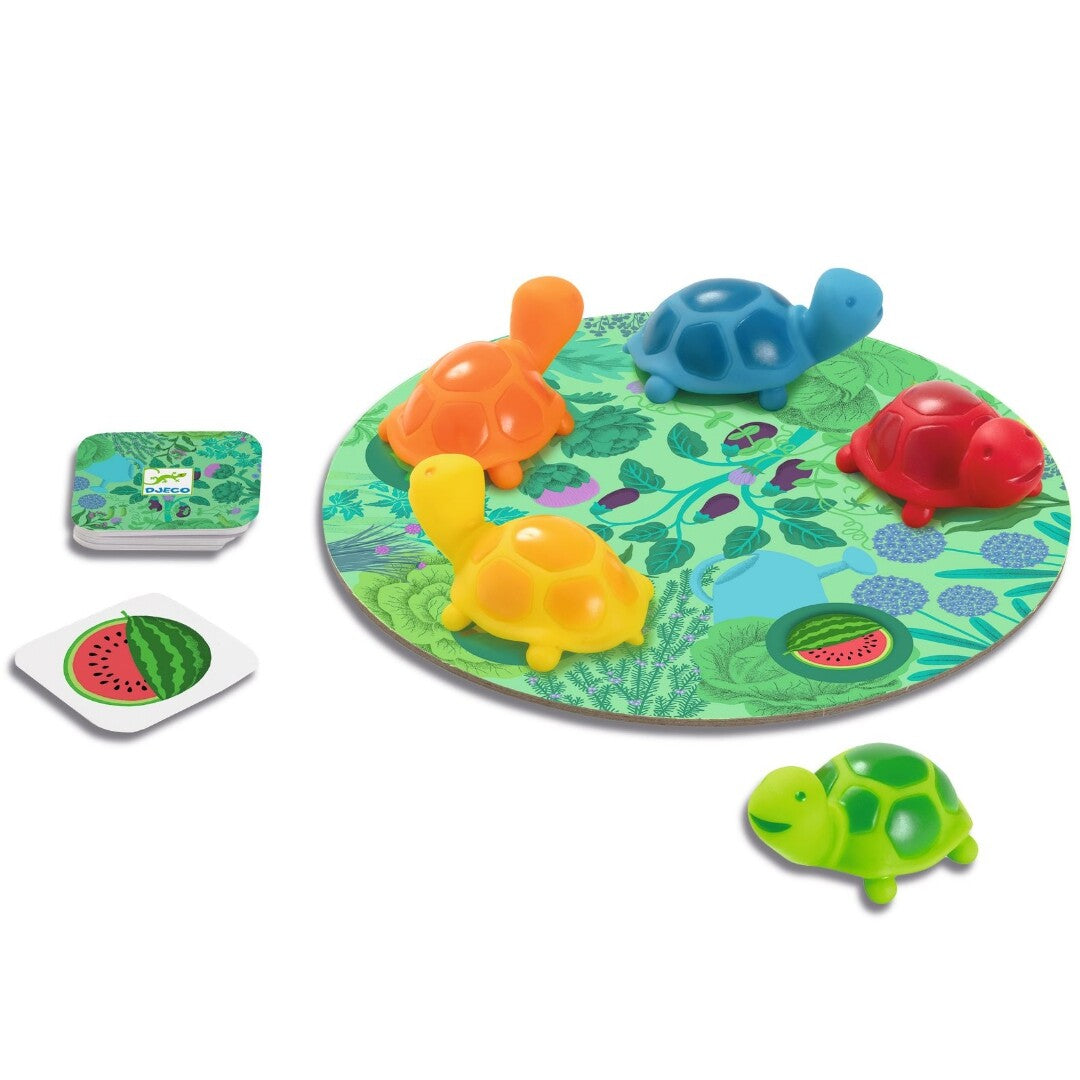 Djeco Little Memo Garden memory spel met de ronde speelmat, vijf gekleurde schildpadjes en twee speelkaarten.