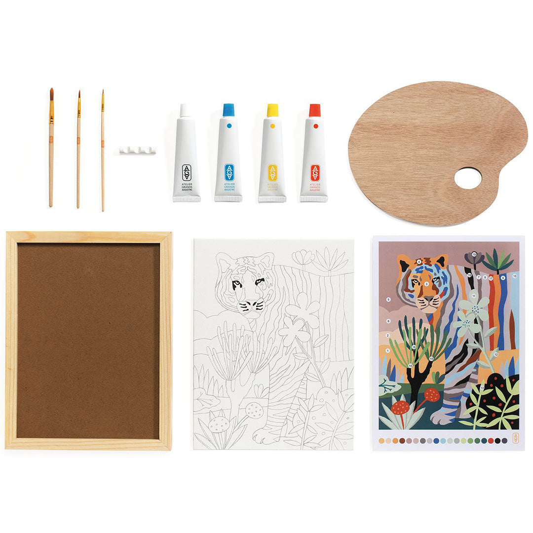 Alle onderdelen van de Djeco knutselset, inclusief een houten lijst, canvas, verf en penselen.