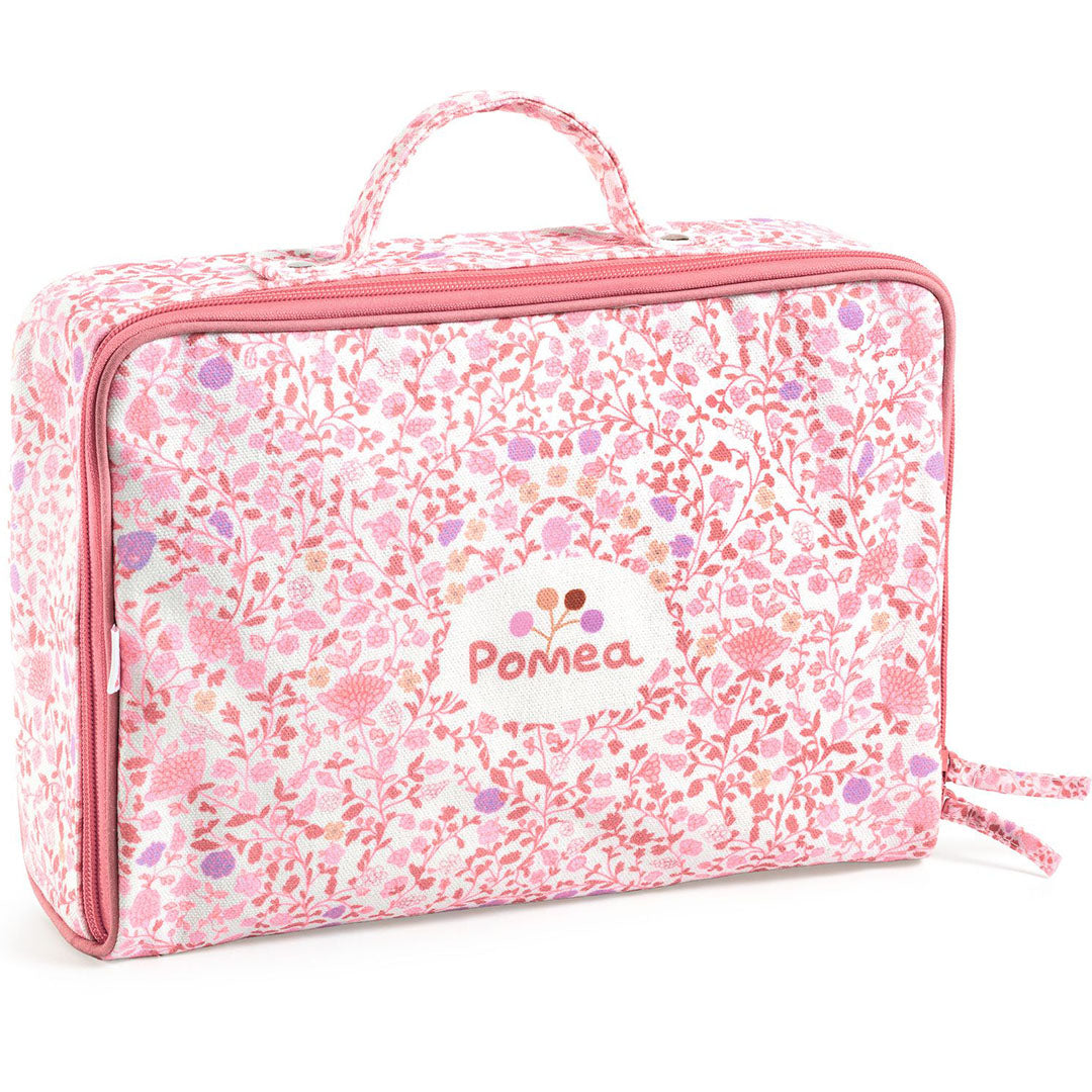 Gesloten Djeco Pomea speelgoedkoffer met roze bloemenpatroon.