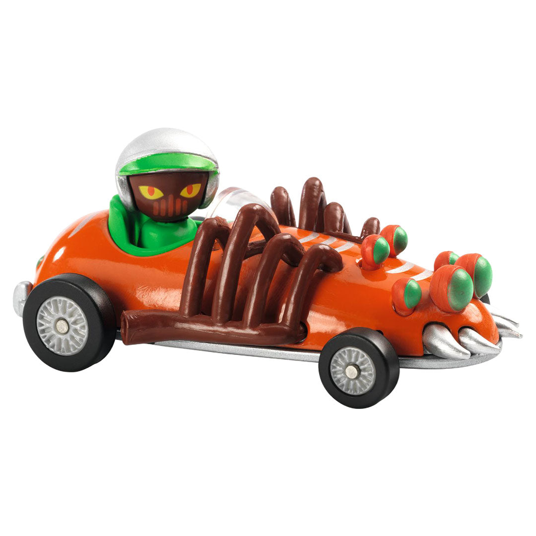 Djeco Turbo Spider speelgoedauto met oranje carrosserie, bruine spinnenpoten en een bestuurder met groene helm.
