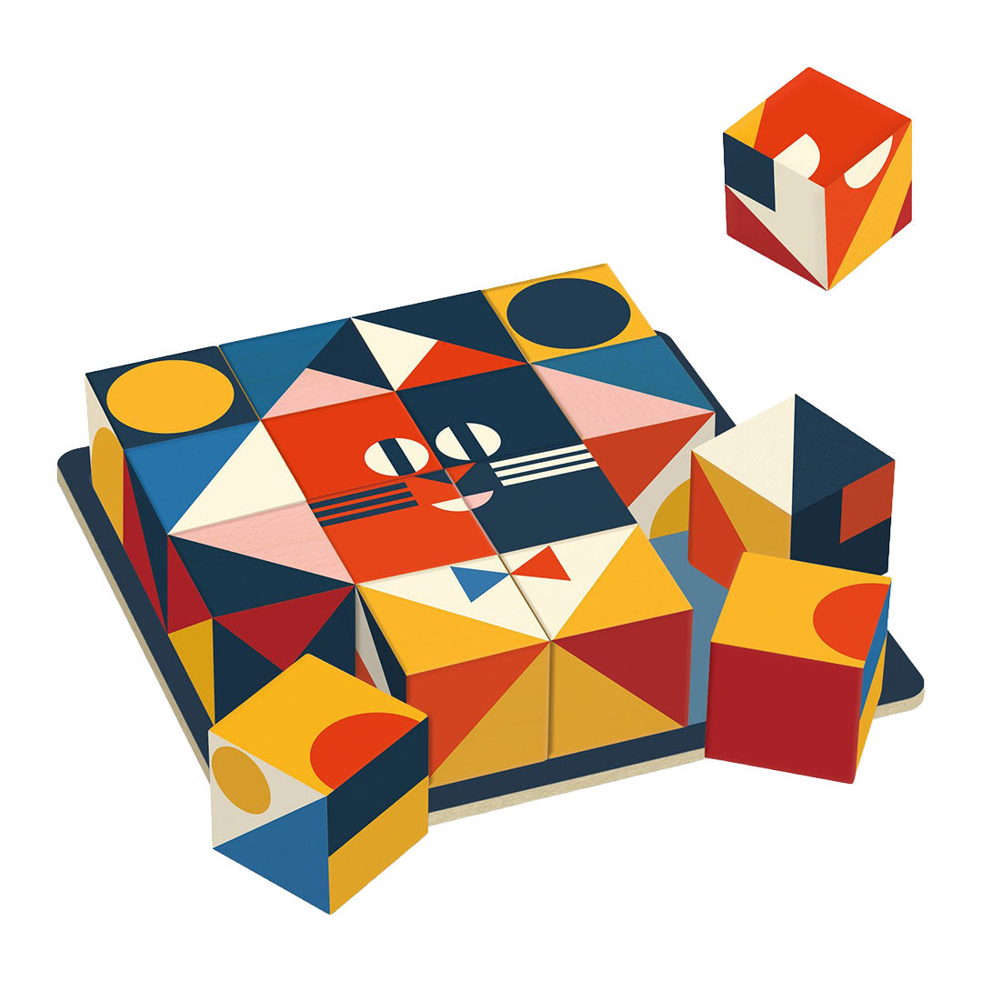 Djeco Sologic Cubologic 16 blokpuzzel met geometrisch kattengezicht patroon op een blauwe ondergrond.