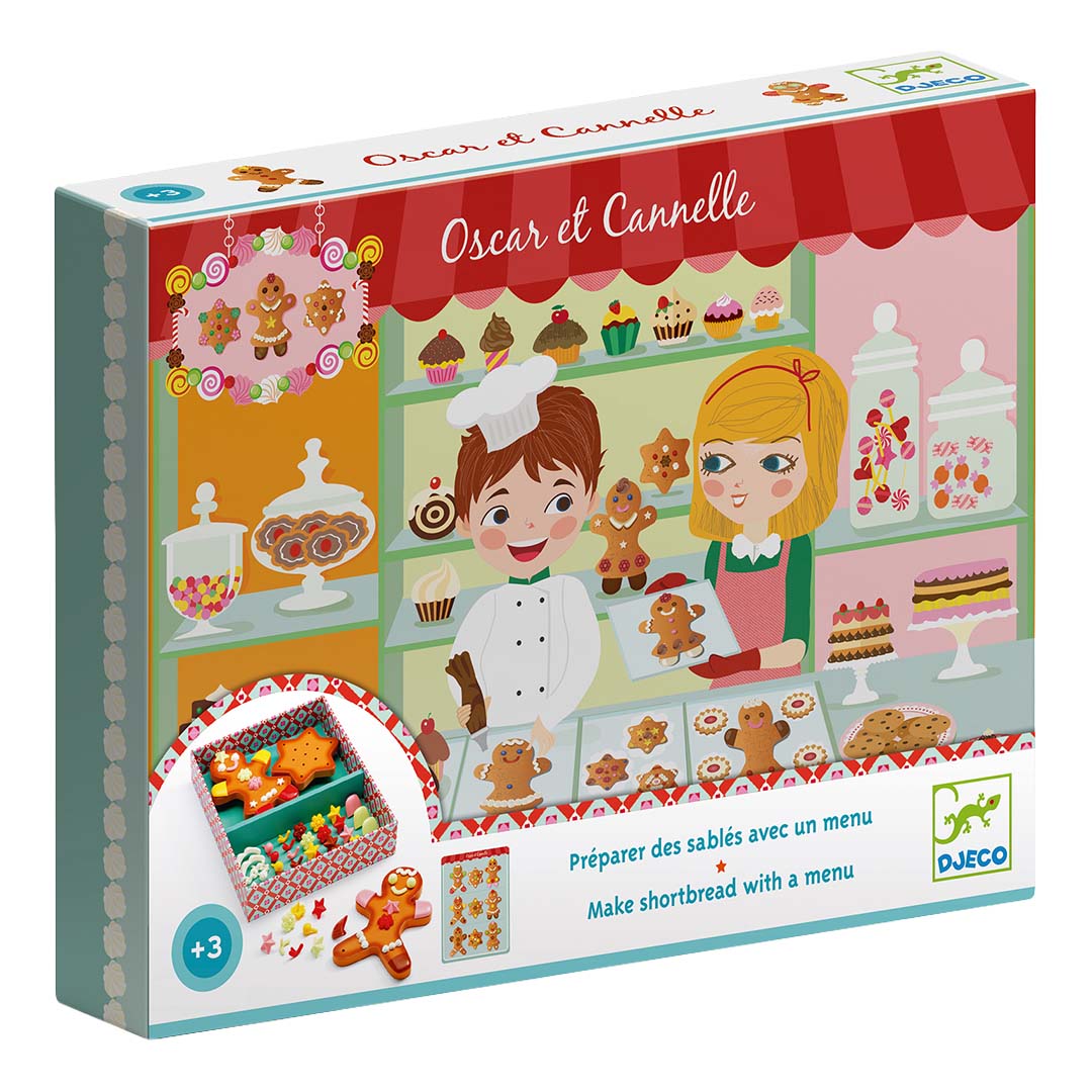 De voorkant van de Djeco speelgoedverpakking met een illustratie van een bakkerij en kinderen die gingerbread koekjes versieren.