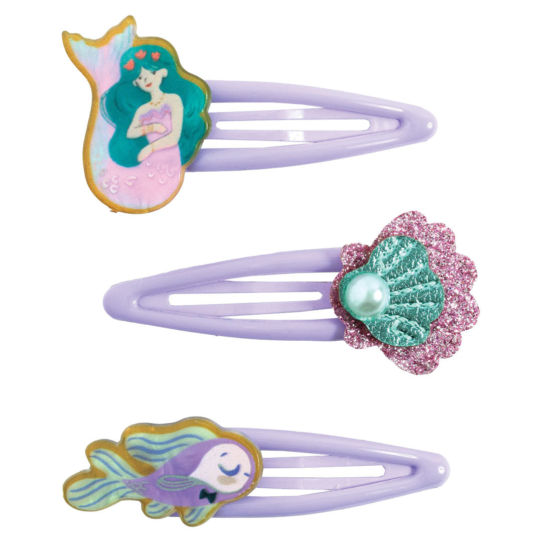 Djeco haarspeldjes met een zeemeermin, een schelp en een vis op een witte achtergrond.