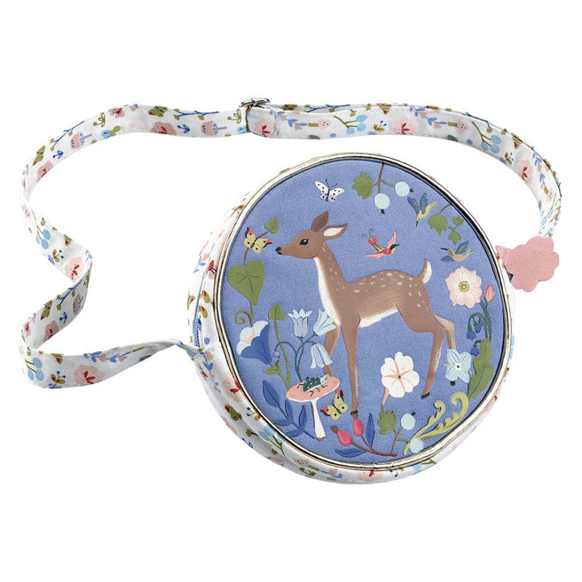 Djeco kinderhandtas met een illustratie van een hert in een bloementuin en een bloemenprint schouderband.