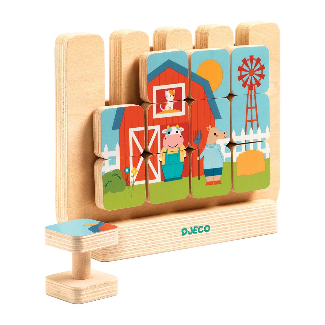 Djeco houten puzzel met boerderijthema, opgebouwd met een schuur, koe, paard en windmolen.