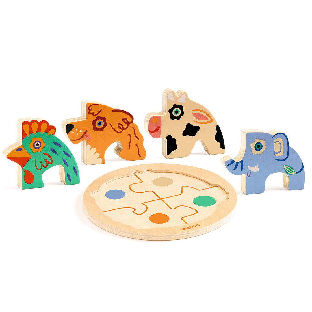 Djeco houten puzzel Rondo Dog met de vier losse dierenfiguren naast de ronde puzzelbasis.