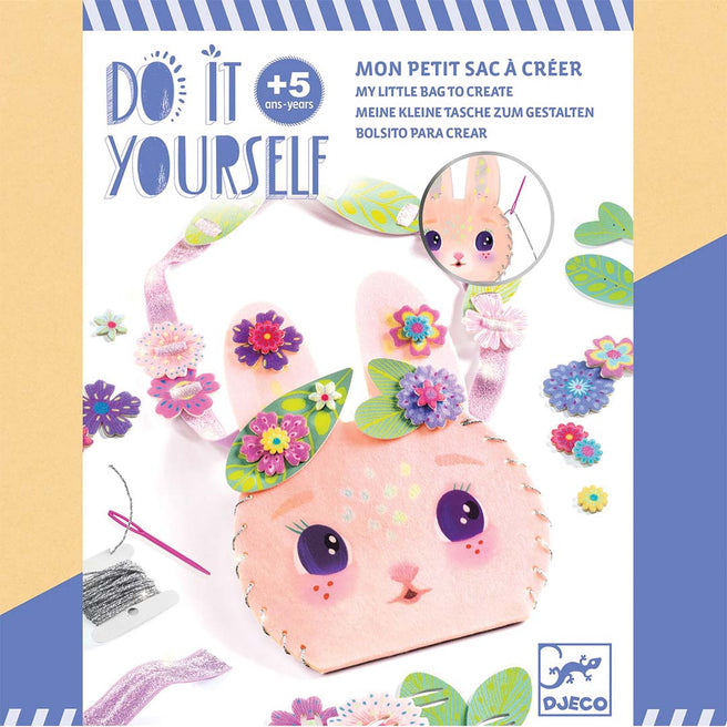 Djeco knutselset tas - miss bunny verpakking met een roze konijnenhandtasje en bloemdecoraties.