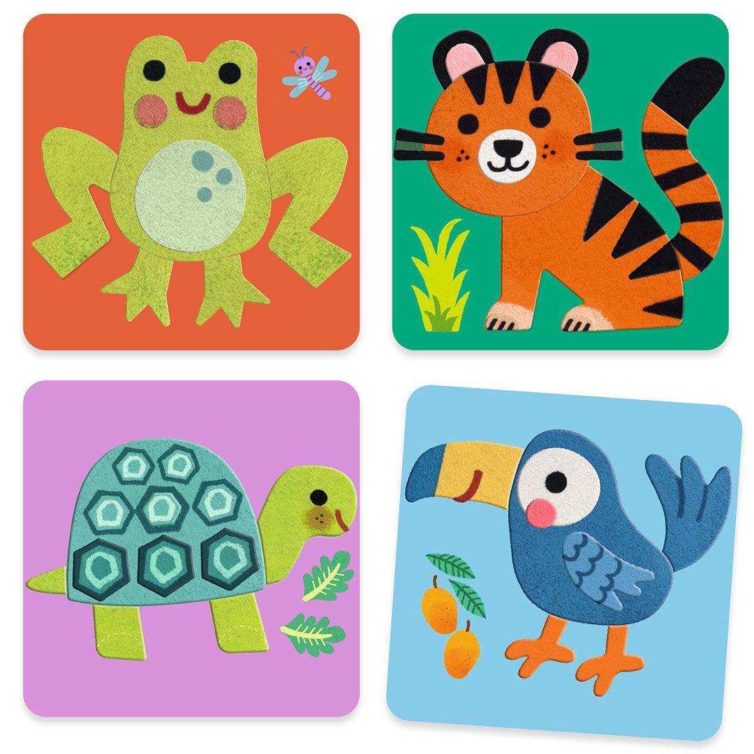 Vier voltooide vilten dierenfiguren: een kikker, een tijger, een schildpad en een toekan.