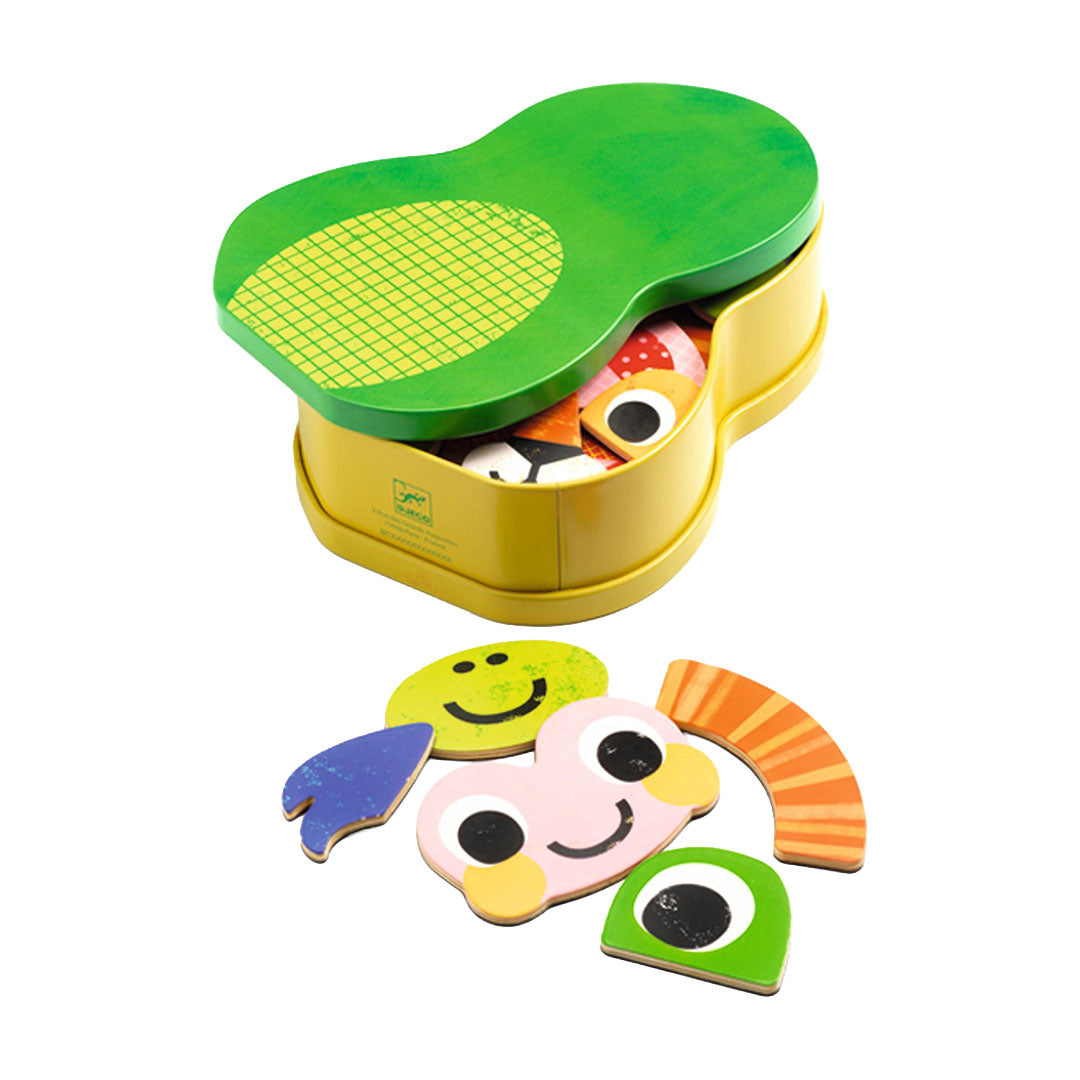 De Djeco Inzebox Zanimals opbergdoos met een groene deksel en diverse kleurrijke houten magneetpuzzelstukken.