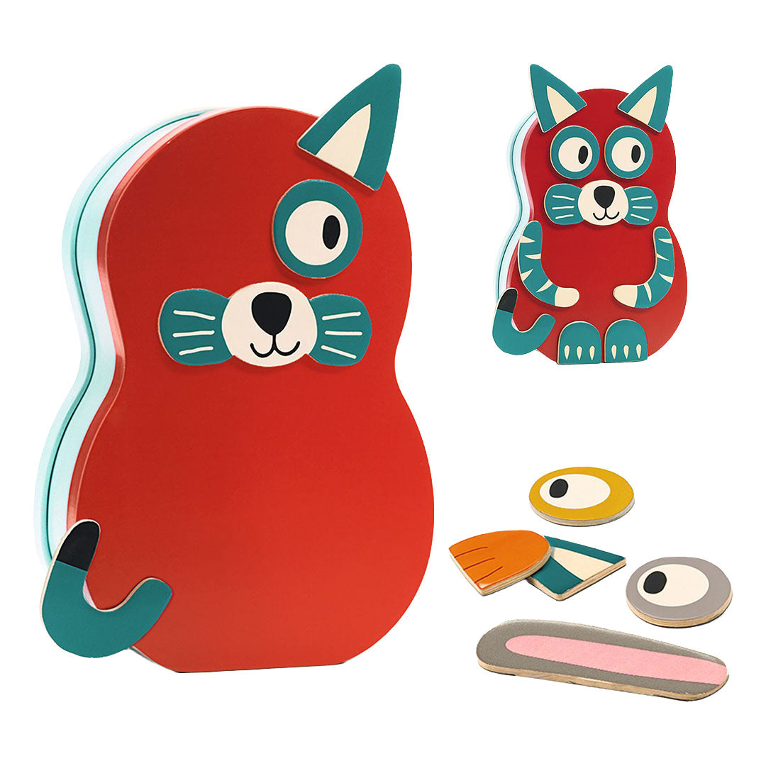 Een rood dier, mogelijk een vos of kat, samengesteld met het Djeco Inzebox Animo magnetisch speelgoed, met losse onderdelen ernaast.