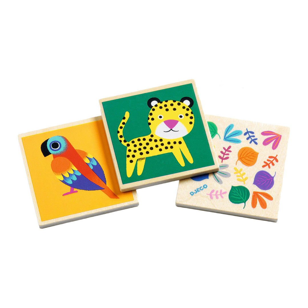 Drie houten memorie tegels met een jaguar, papegaai en bladeren.