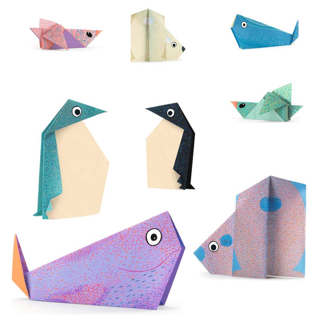 Collectie van verschillende gevouwen origami pooldieren, waaronder walvissen, pinguïns en vogels, op een witte achtergrond.
