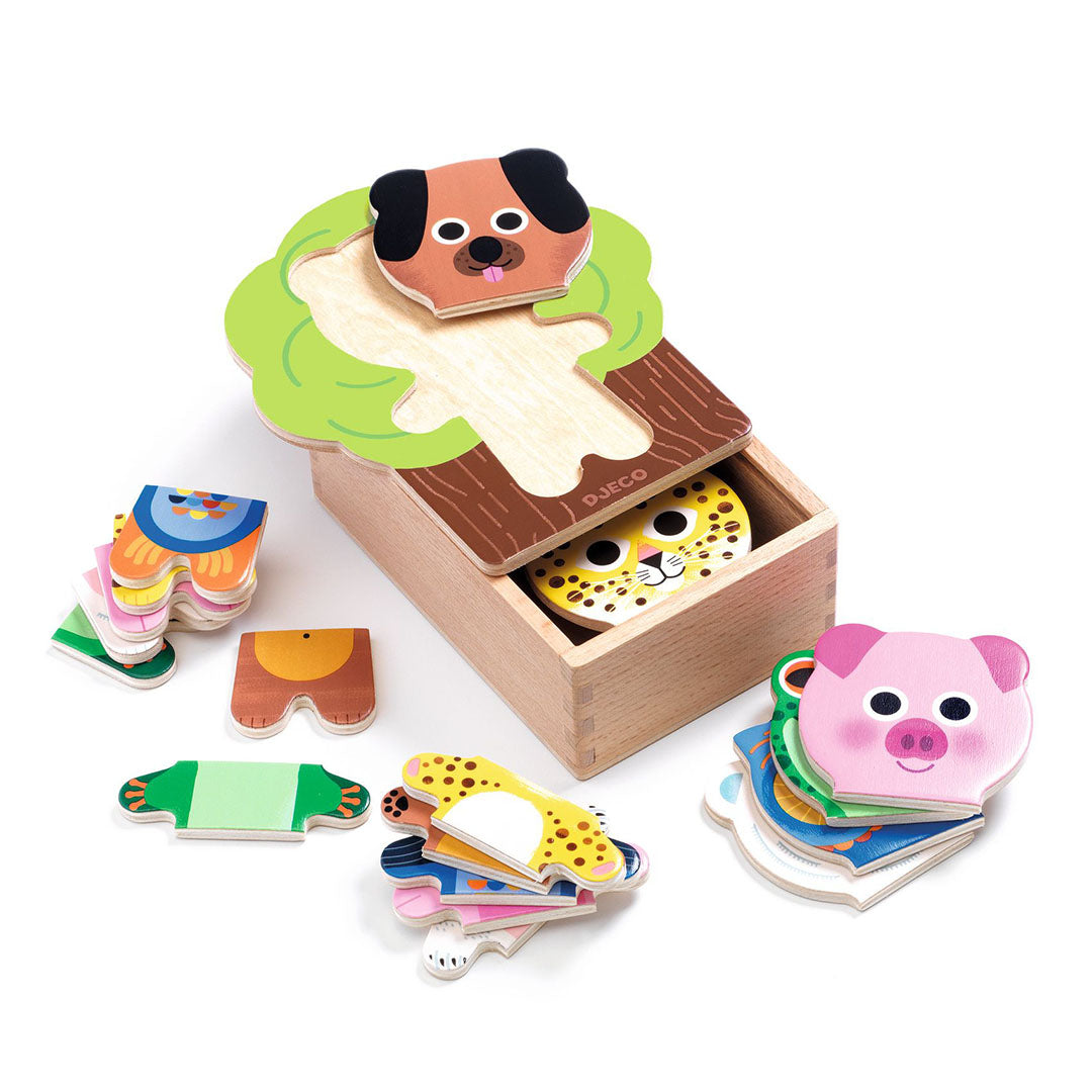 Djeco houten dierenpuzzel met een boomvormige doos, een hondenhoofd en losse puzzelstukken van verschillende dieren.