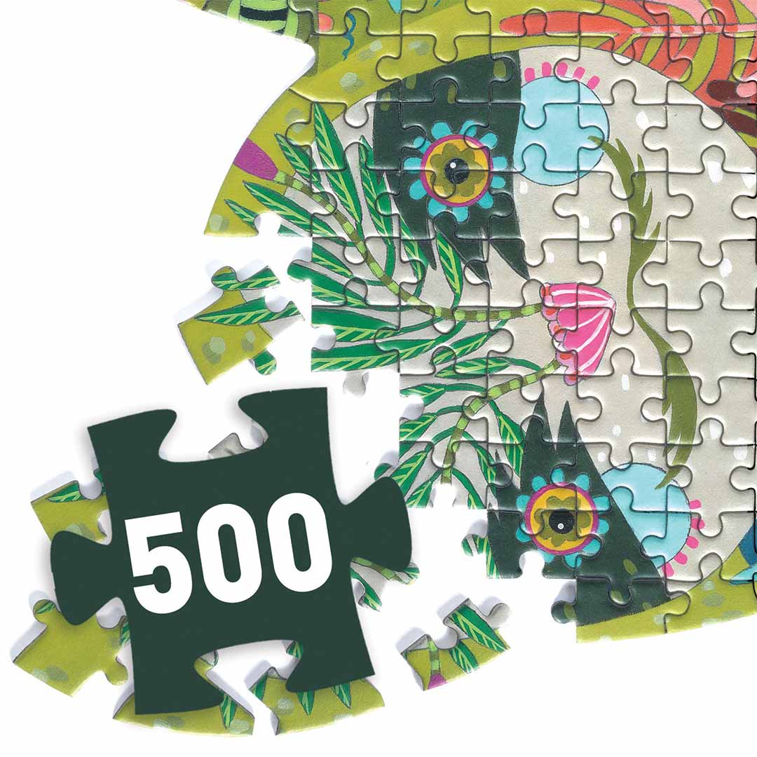 Detail van de Djeco Puzz'Art legpuzzel met losse stukjes en een puzzelstuk met het getal 500.