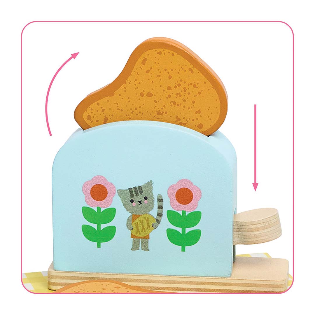 Detail van de houten speelgoedbroodrooster met een toastje dat omhoog komt, met pijlen die de beweging aangeven.