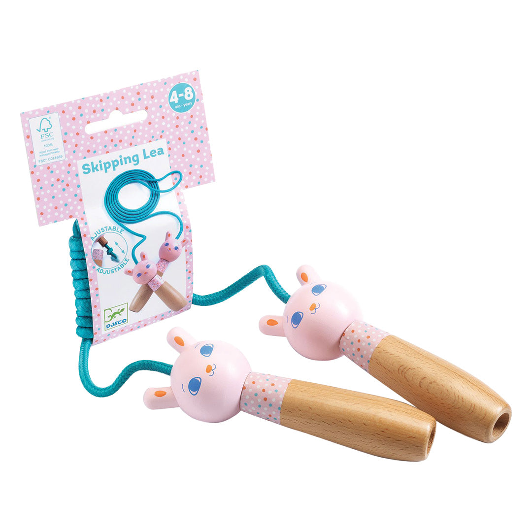 Djeco springtouw met konijnenhandvatten naast de roze productverpakking.