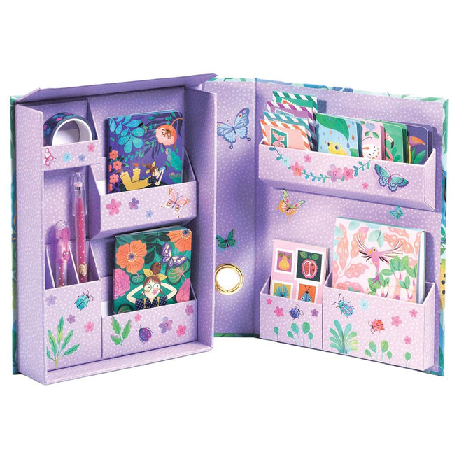 Djeco hobbyset met open paarse stationary box in tropische tuinthema, gevuld met schrijfwaren.
