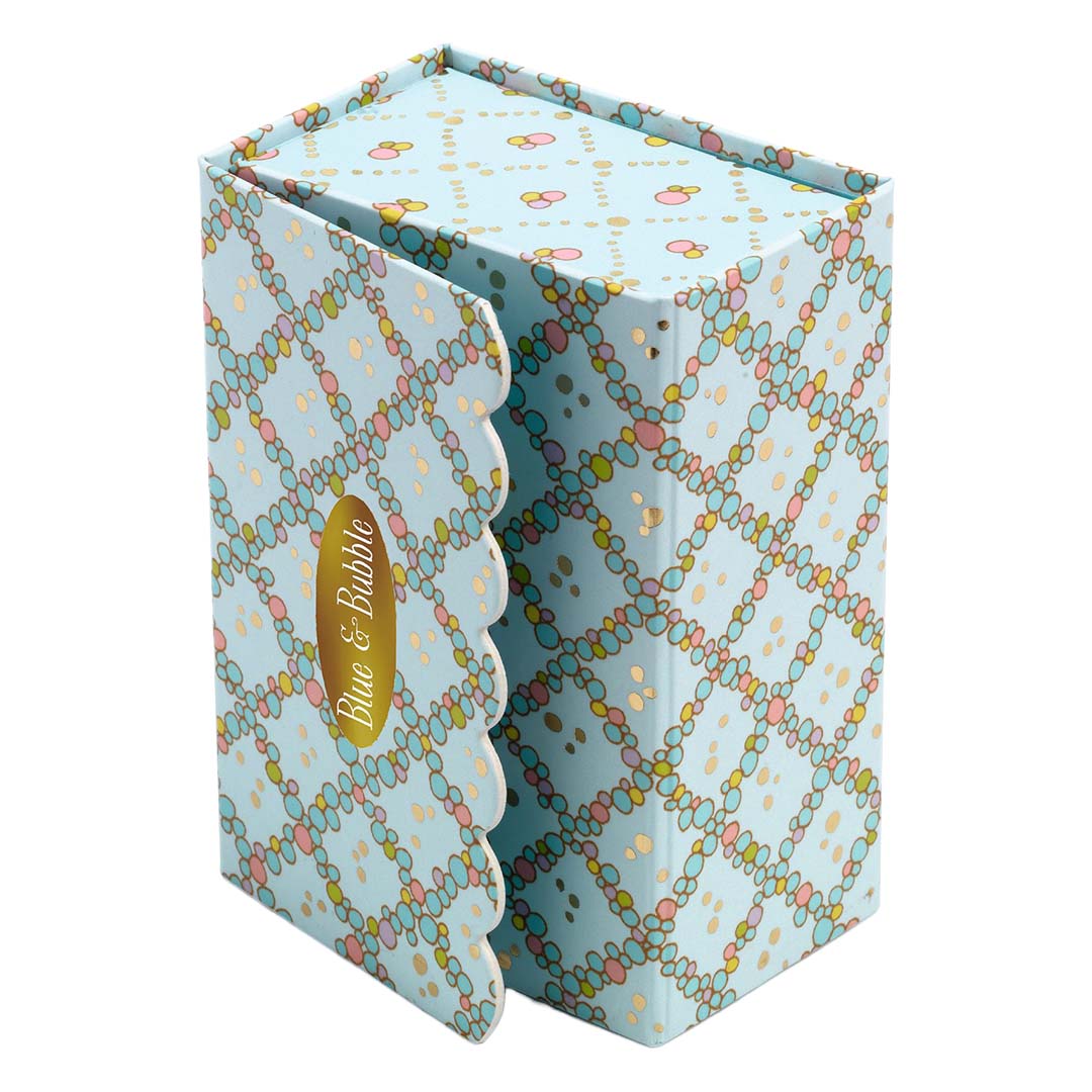 De gesloten verpakking van de Djeco Tinyly speelset Tinyroom Blue, een blauwe doos met patroon en een gouden 'Blue & Bubble' label.