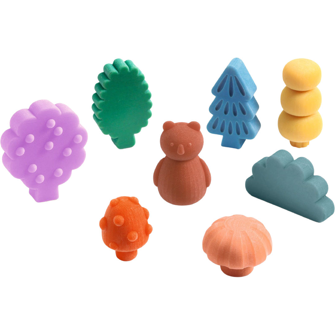 Djeco waskrijtjes in de vorm van een beer, bomen, paddenstoelen en een wolk.