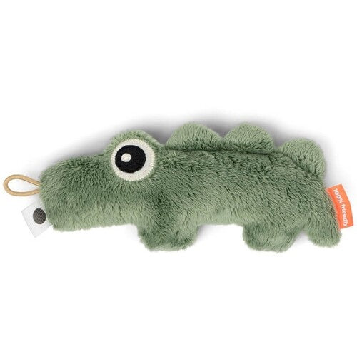 Done by deer groene sensorische rammelaar in de vorm van een krokodil met open ogen.