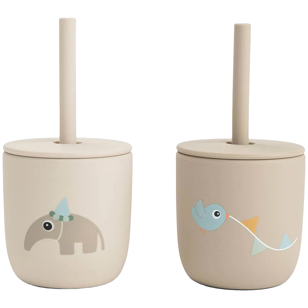 Twee Done by Deer beige kinderbekers met rietje, versierd met een olifant en een vogel.