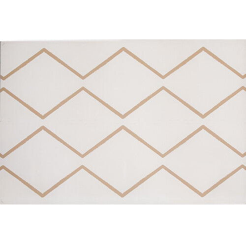 eeveve foam speelmat met beige geometrisch patroon, van bovenaf gefotografeerd.
