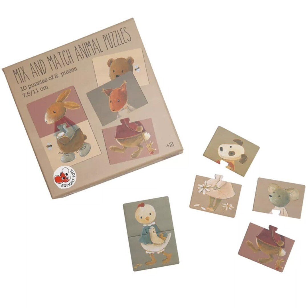 De Egmont Toys mix en match dierenpuzzelverpakking naast losse puzzelstukjes met dierenfiguren.