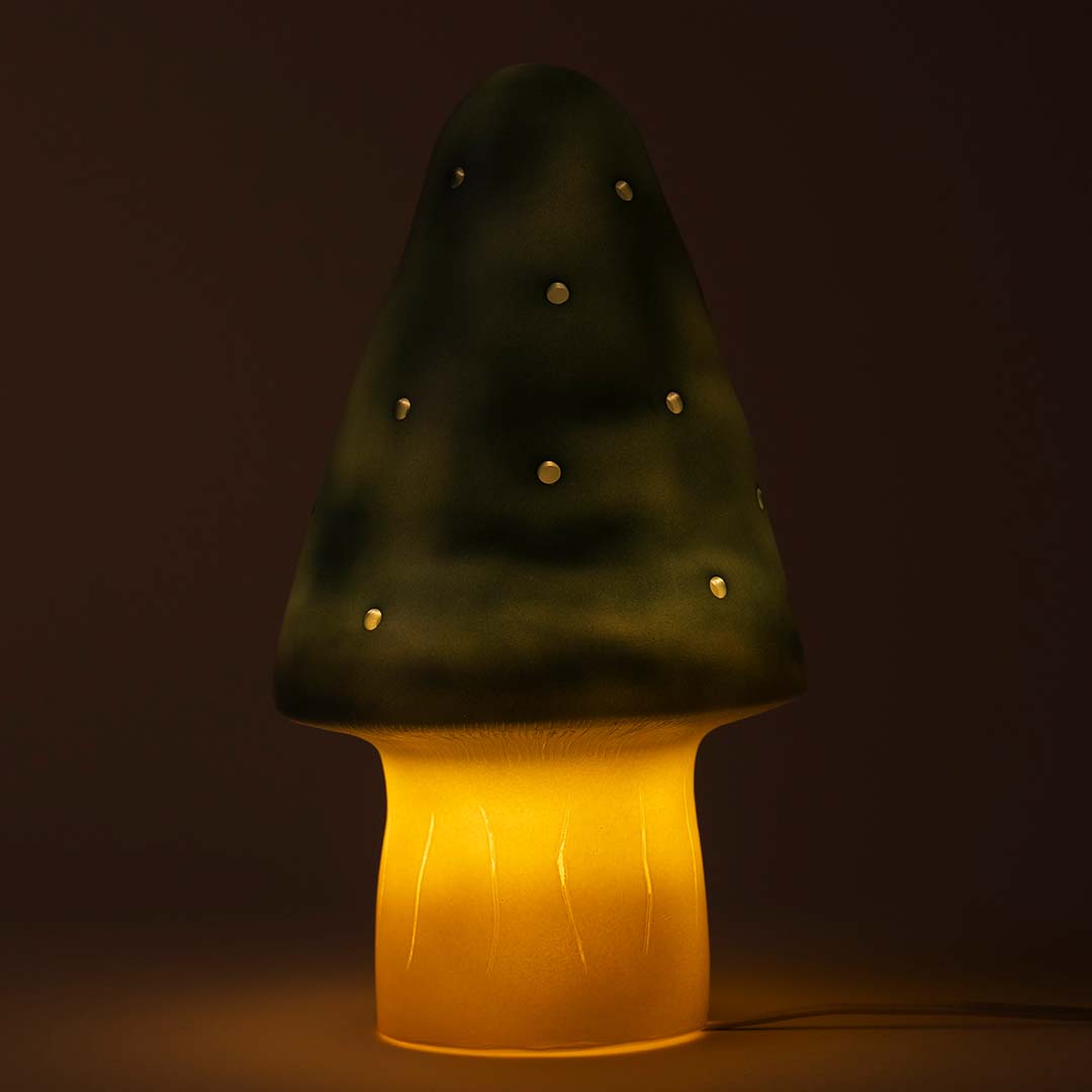 Egmont Toys paddenstoel nachtlamp die licht geeft in het donker, met een geelgloeiende steel en lichtpuntjes in de kap.