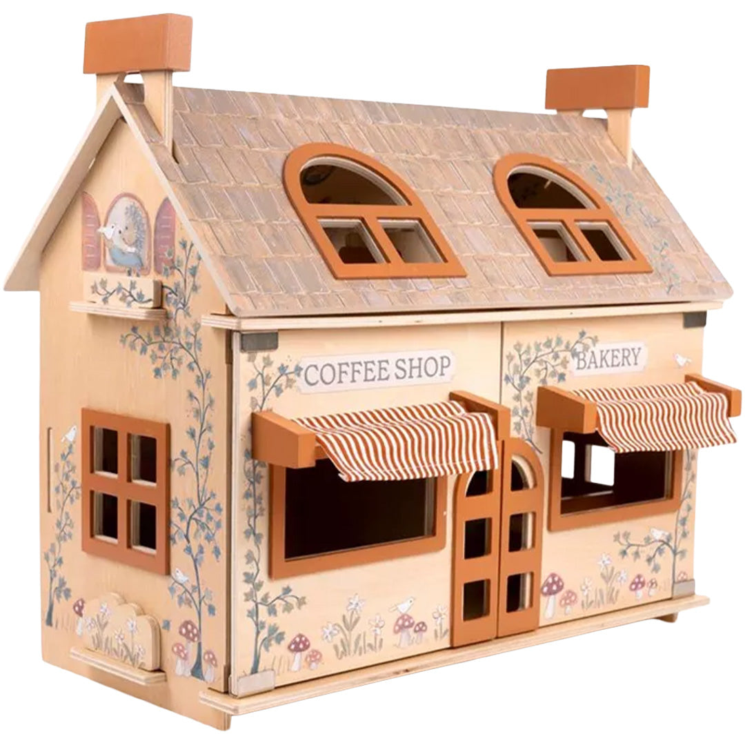 Egmont Toys houten poppenhuis in de vorm van een koffiehuis en bakkerij met gestreepte luifels en geschilderde bladeren.