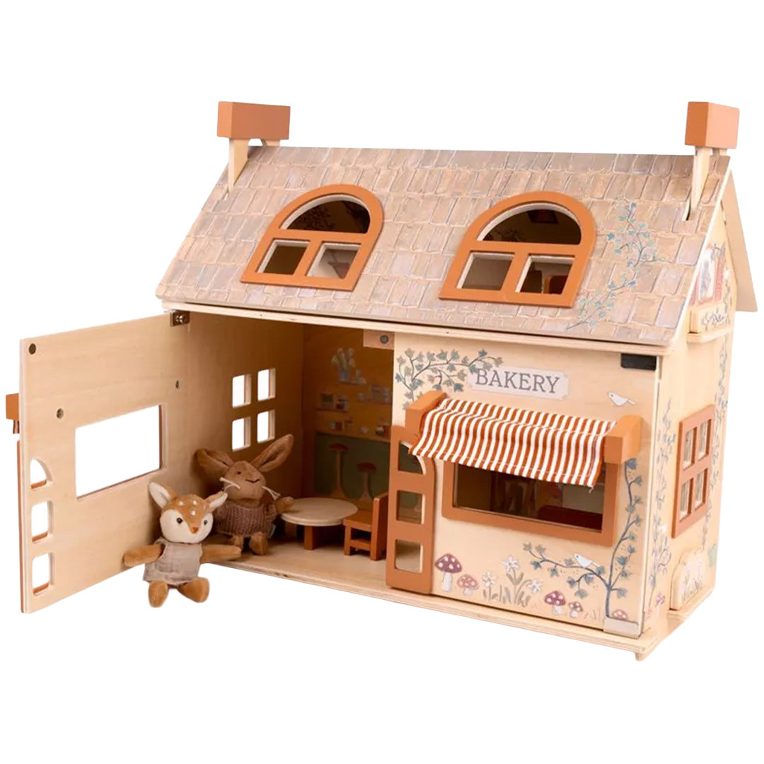 Egmont Toys houten poppenhuis geopend, met een interieur van een bakkerij en twee knuffeldieren.