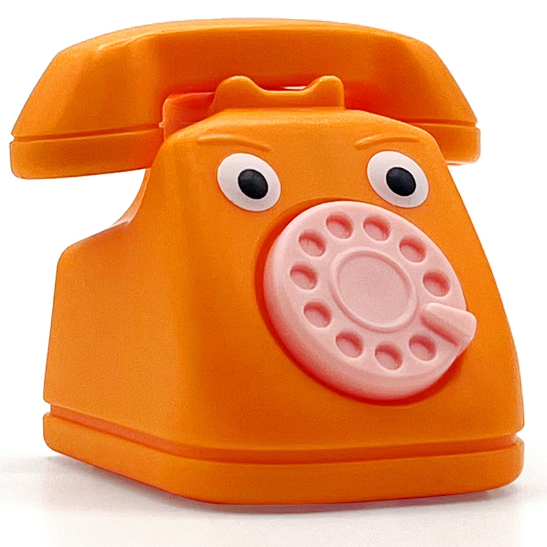 Fidget go oranje telefoon friemelspeelgoed met googly ogen en roze draaischijf, schuin van voren.