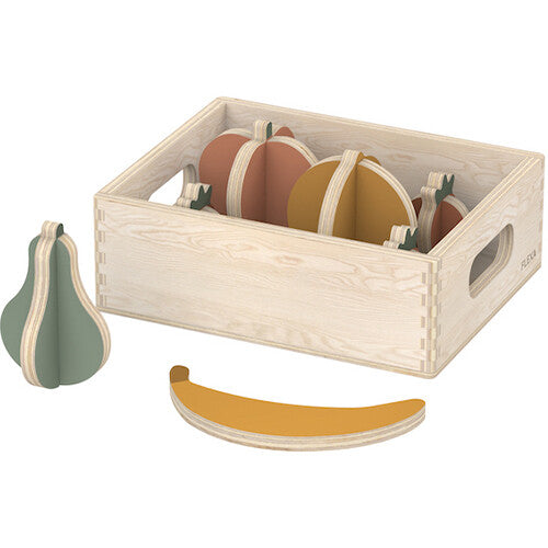 Flexa houten speelgoedfruit in een houten kistje, met een peer en banaan ernaast.