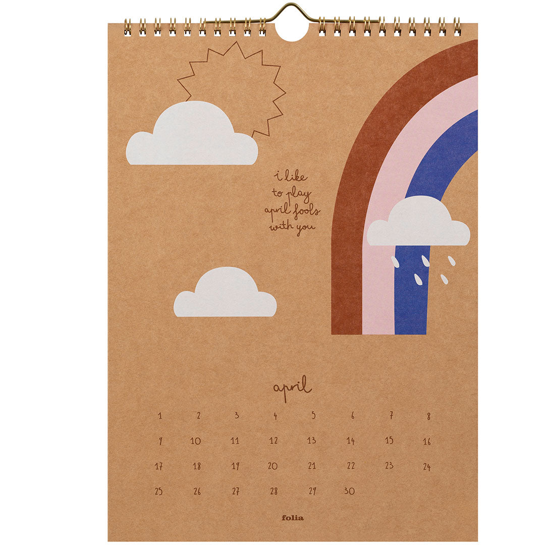 Folia wandkalenderpagina voor april met een regenboog, wolken en zon.