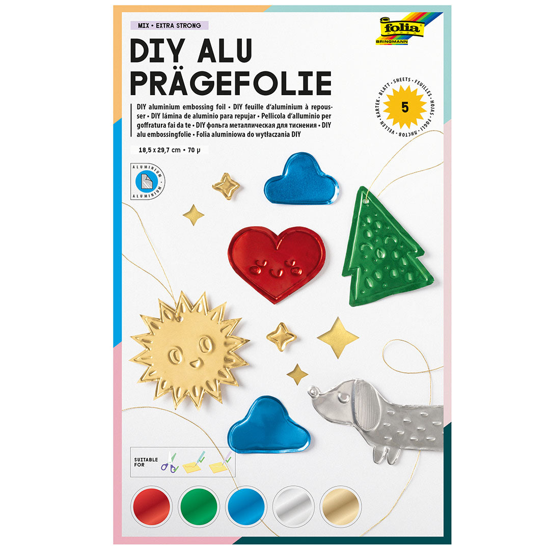 De verpakking van Folia DIY Alu Prägefolie toont diverse gekleurde, reliëf aluminium figuren zoals een zon, hart, wolken, kerstboom en hond.