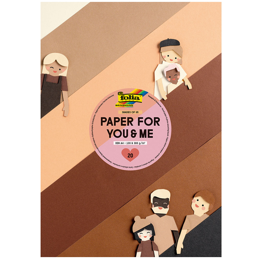 Folia knutselpapier 'Shades of Us' met diverse huidtinten en papieren figuren op een schuine achtergrond.