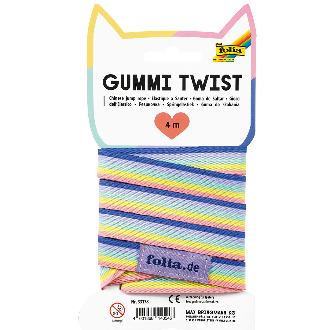 Achterkant van de folia regenboog gestreepte springtouw gummy twist verpakking met productinformatie.