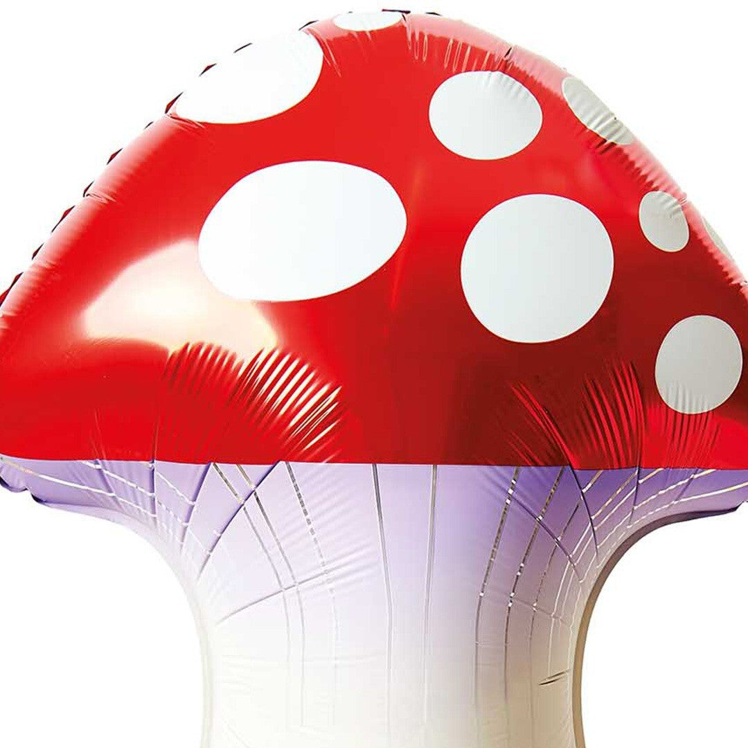 Detailopname van de rode paddenstoel folieballon met witte stippen.
