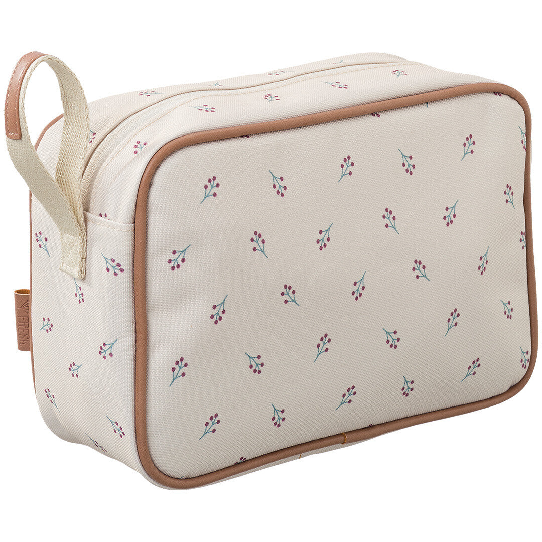Fresk beige toilettas met besjespatroon en handvat, schuin van bovenaf.