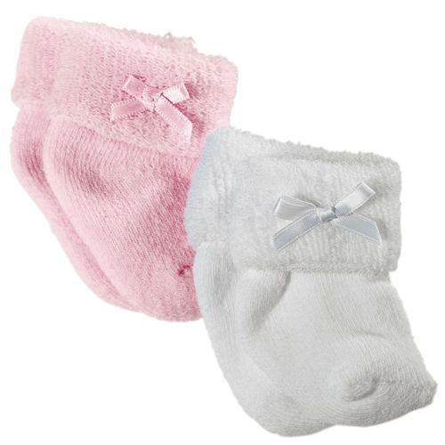 Götz babypoppensokjes in roze en wit met satijnen strikjes.