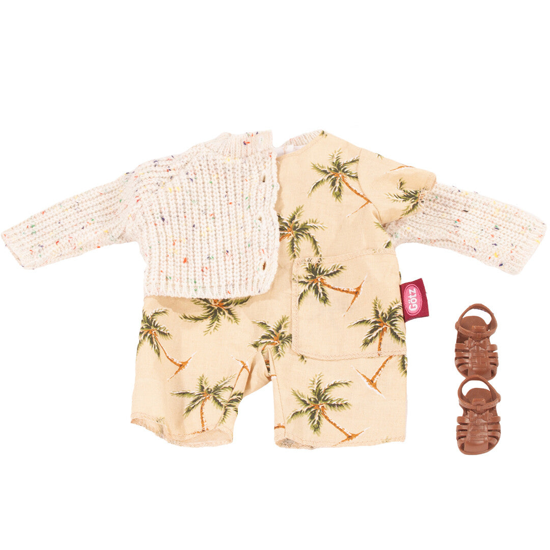 Götz poppenkledingset met beige romper met palmboomprint, een gebreid vestje en bruine sandalen.